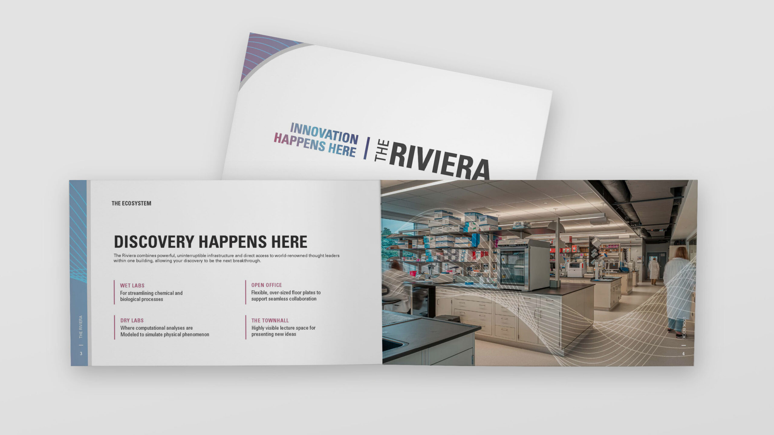 A brochure titled "THE RIVIERA" showcasing an open booklet. The left page reads "DISCOVERY HAPPENS HERE" with features like "WET LABS" and "DRY LABS." The right page shows a modern laboratory with equipment and ample lighting.