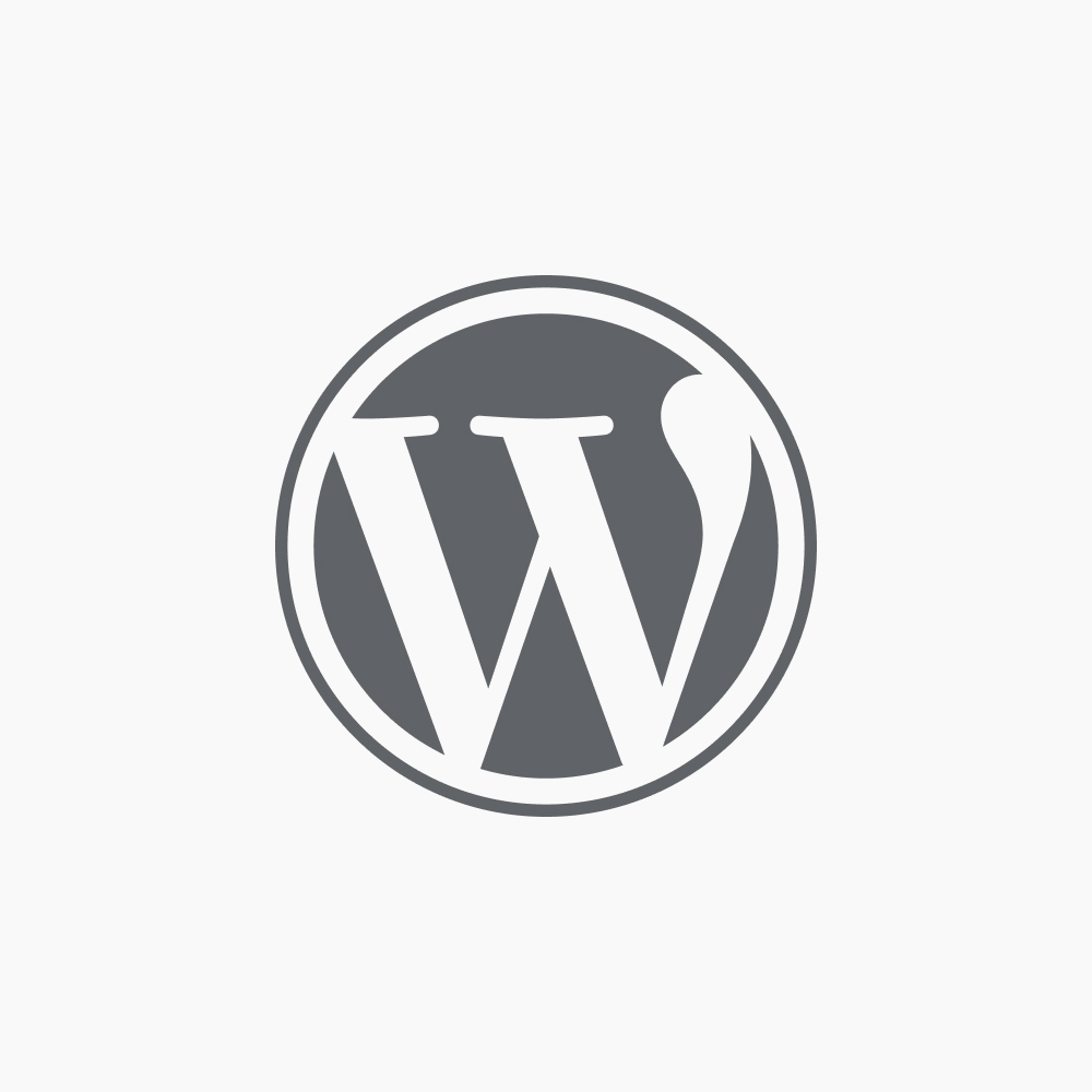 WordPress logo in grayscale, featuring a stylized "W" inside a circle on a plain white background.