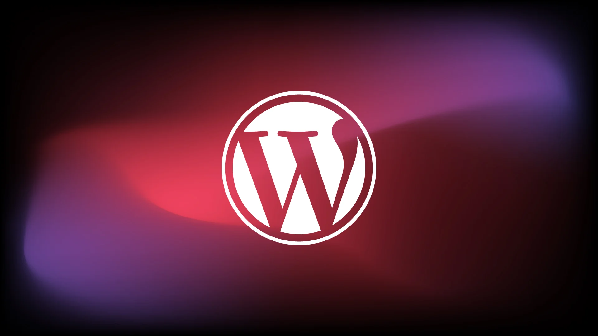 WordPress logo in white against a gradient background of red, purple, and black hues, creating a dynamic and vibrant effect.